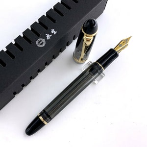 Wingsung 699 vacuümvullende vulpen, doorschijnende zwarte acryl gouden clip schrijfpen, extra fijne/fijne/medium penpunt inktpen