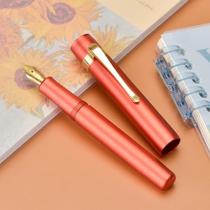 Hongdian M2 mini-vulpen oranje aluminium zakpen, EF/F/M-punt kort schrijfcadeau