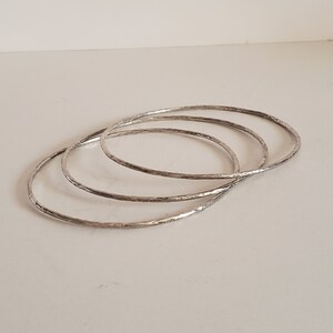Vintage Set of Three Bracelets Artisan Hand Made Hammered Sterling Silver Thin Stackable Bangles