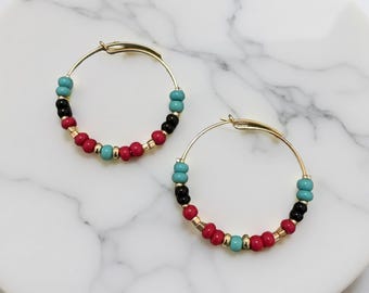 Gold-plated brass hoop earrings adorned with seed beads