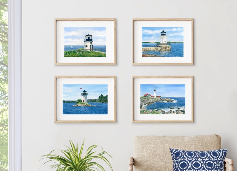 Maine lighthouse prints in a gallery wall arrangement.