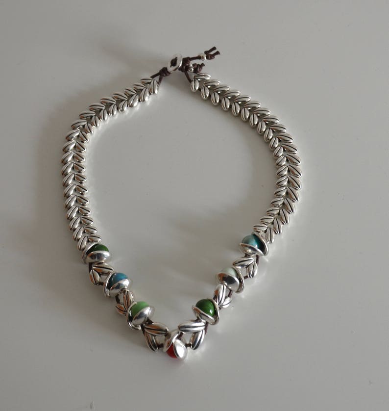 antique silver color necklace. My favorite short necklace,natural elements with leaves and red flower bud,leaves necklace