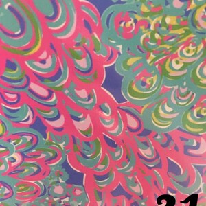 May include: A bright, patterned design in shades of pink, teal, blue, and green. The abstract pattern features curved lines and floral motifs. The number "31" is printed in black at the bottom right corner of the image.