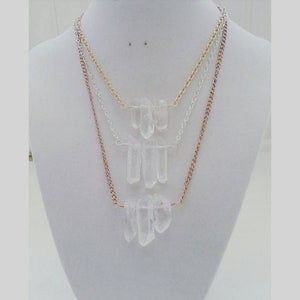 Clear quartz point necklaces
