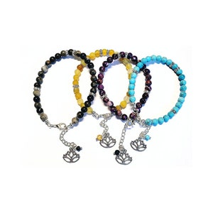 Gemstone beaded bracelets with silver lotus flower charm.