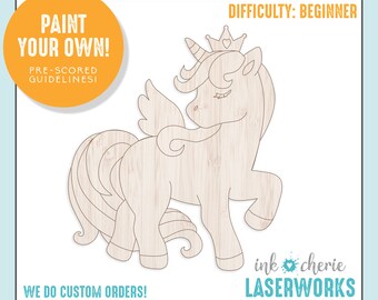 May include: A wooden cutout of a unicorn with a crown and wings. The unicorn is ready to be painted. The text "PAINT YOUR OWN!" and "PRE-SCORED GUIDELINES!" is on the image. The text "WE DO CUSTOM ORDERS!" is at the bottom of the image. The text "DIFFICULTY: BEGINNER" is at the top of the image. The text "ink cherie LASERWORKS" is at the bottom right of the image.