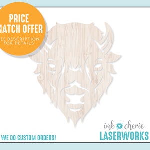 May include: White wooden cutout of a buffalo head with a wood grain texture. The text "ink cherie LASERWORKS" is in the bottom right corner of the image. The text "PRICE MATCH OFFER SEE DESCRIPTION FOR DETAILS" is in a yellow circle in the top left corner of the image. The text "WE DO CUSTOM ORDERS!" is in the bottom left corner of the image.