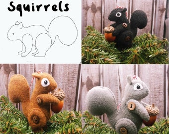 May include: Four felt squirrel ornaments, two brown, one gray, and one black. Each squirrel is holding an acorn. The word "Squirrels" is written in black on a white background.