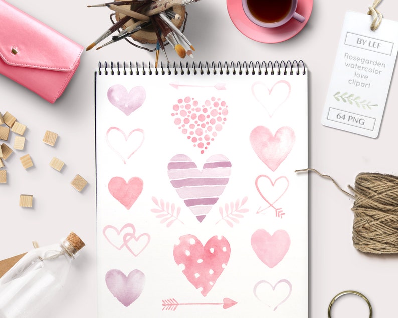 May include: A collection of 14 watercolor hearts in various shades of pink, with some hearts featuring polka dots, stripes, and outlines. The hearts are arranged on a white background with a few arrows and leaves.