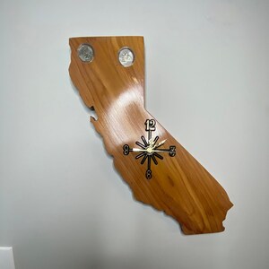 California State Quarter Clock. Handmade. Clock can be made of red cedar, oak, pine, cherry & black walnut wood. Quarters are inlayed.