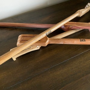 Best backscratchers on ETSY. Turned and cut by hand. Can make of oak, cherry, walnut, cedar & pine. Finished with polyurethane.