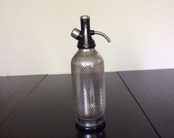 Mesh seltzer glass bottle