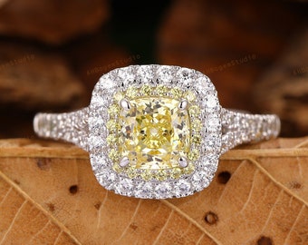 Anello con diamante giallo hotsell prezzo