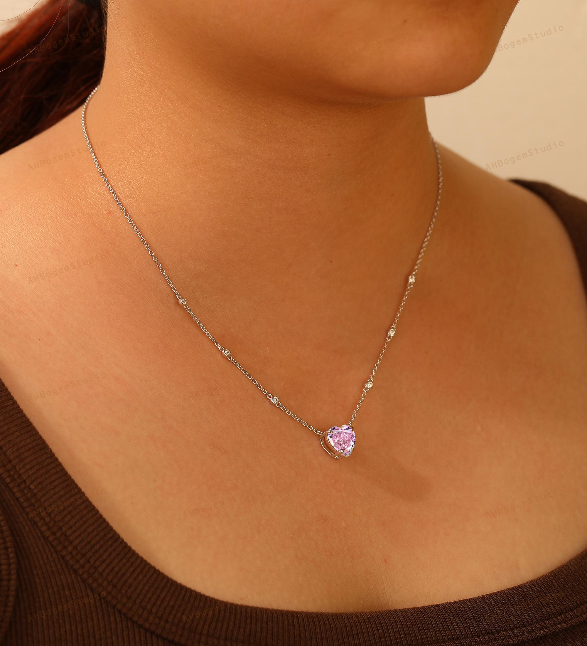 Collana con fiocco in argento sterling e cuore decorato con