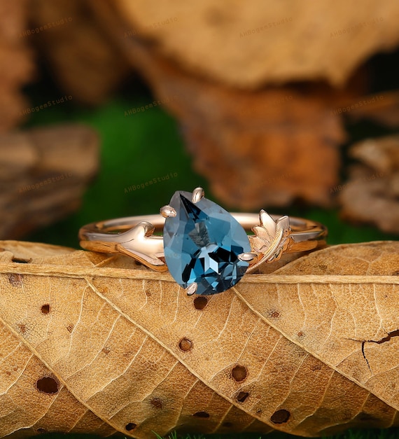 Pear Shaped London Blue Topaz Engagement Ring Rose Gold Solitaire
