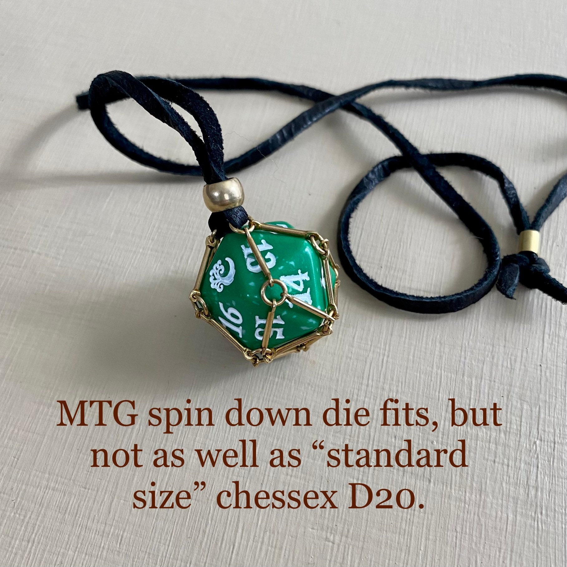 CAGED D20 NECKLACE (MYSTIC STORM) – Mystic Dragon Games