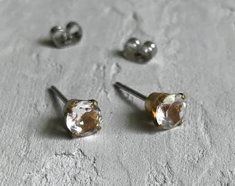 clear topaz gold stud earrings