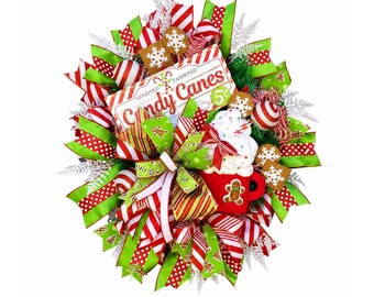 Guirnalda navideña de bastones de caramelo, decoración navideña de puerta con temática de pan de jengibre, tema rojo, verde y blanco.