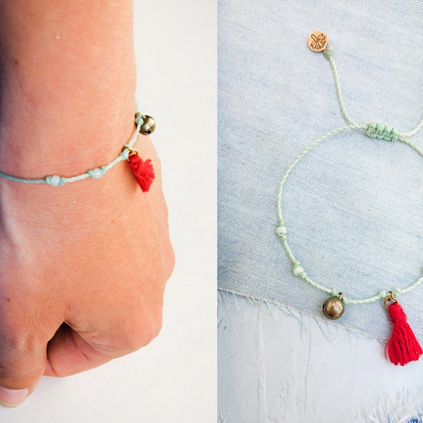 Thai Summer Bracelet /// MINT waxed cord bracelet / SILK / Thai Bell bead /  Lotus Charm / Red Silk Tassel