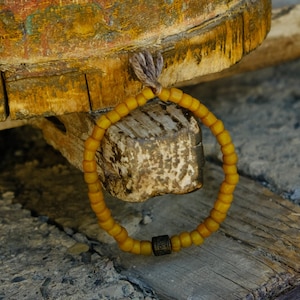 unisex HIMALAYAN PRAYER WHEEL bracelet Om Mani Padme Hum mantra bracelet with Yak Wool tassel Stretch bracelet Yellow Ochre glass
