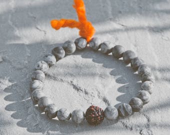 AGHORI bracelet  / ash jasper and rudraksha / matte jasper stone / wool tassel / stretch bracelet