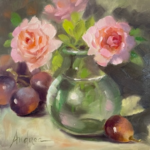 May include: A still life painting of pink roses in a green glass vase with grapes on a table. The painting is signed "Andrea".