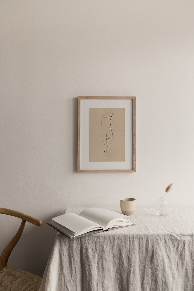 Ink on creased vintage paper design Minimalist nude sketch Download the files and print from home.