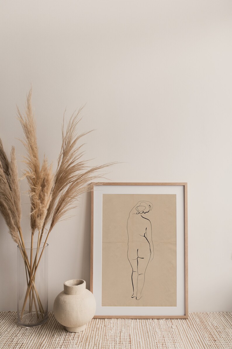 Ink on creased vintage paper design Minimalist nude sketch Download the files and print from home.