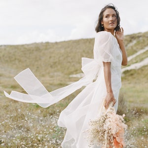 Schönes Kleid Hochzeitskleid aus Seidenorganza mit Puffärmeln Bild 1