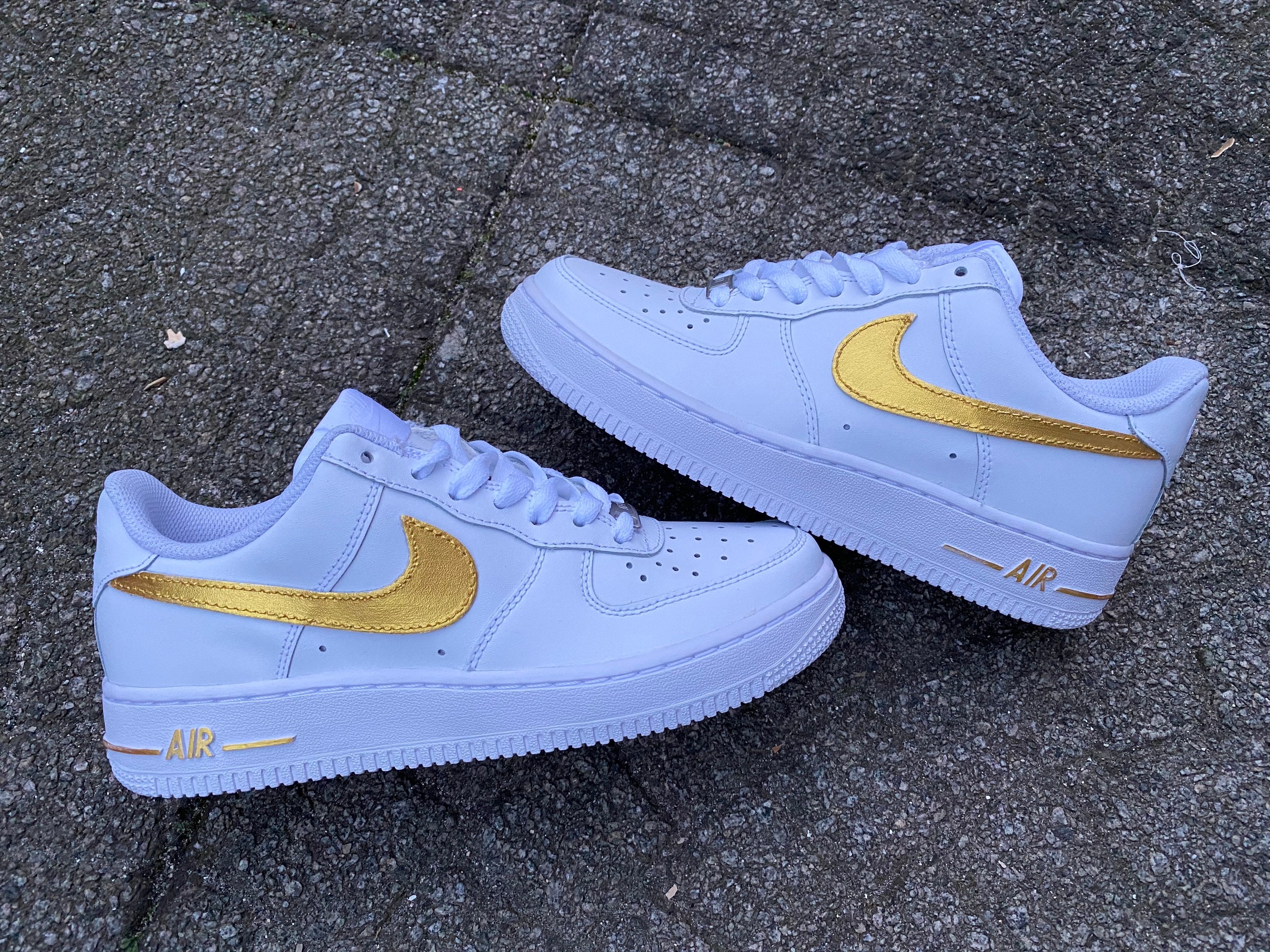 Custom Nike Air Force 1 golden Swoosh Unique and Handpainted 