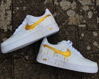 Custom Nike Air Force 1 “Golden drippin’ Swoosh” unique and handpainted sneaker art