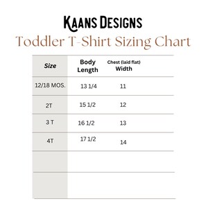 May include: A chart showing toddler t-shirt sizing with measurements in inches. The chart lists sizes from 12/18 months to 4T, with corresponding body length and chest width measurements.