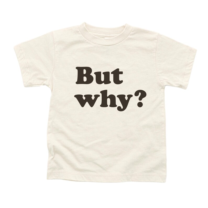 May include: A white t-shirt with the text "But why?" printed in black.