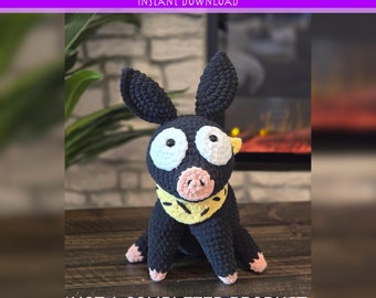 Patrón de crochet para un cerdito sentado con bufanda