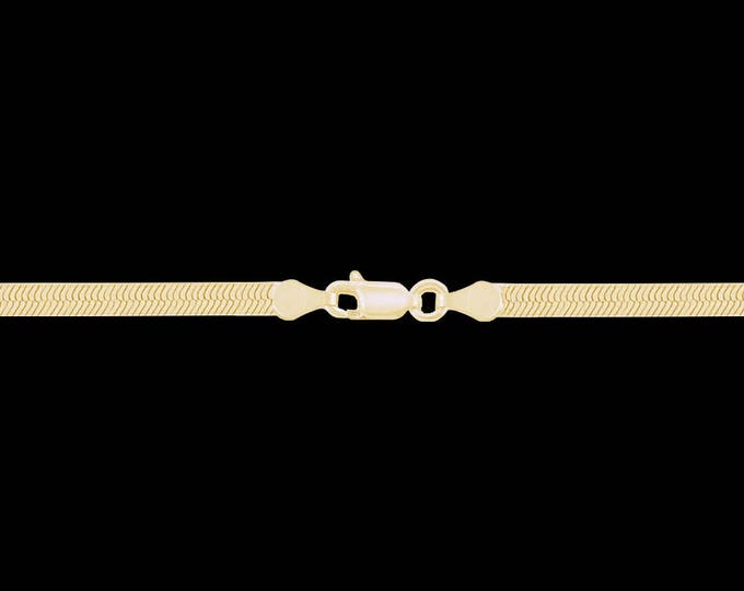 Herringbone chain bracelet in 10k yellow gold, 7.80mm, lobster claw clasp; 7, 8, or 9 inches.