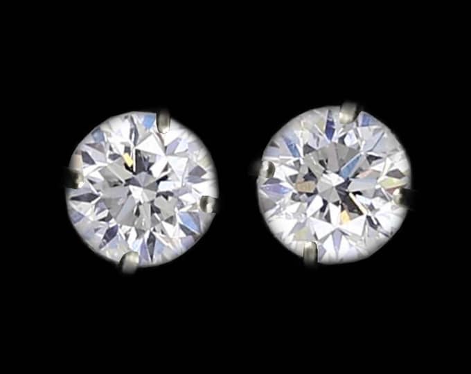 A Pair of Round Brilliant Diamond Earrings in 14K White Gold By C. L. Lewis / Screw-Backs (0.46 TCW) (GOOD-SI2-F+GIA Diamond Dossier's)#C75