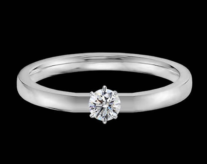 Lewi's 1/4 carat GIA certified diamond engagement ring in platinum.