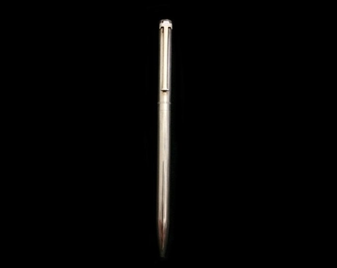 A Fine Mid-Century Tiffany & Co. Retractable "T" Clip Ball Point Pen in Sterling Silver,  w/ New Ink Cartridge,125x10x6 (mm), 23 Grams #4298