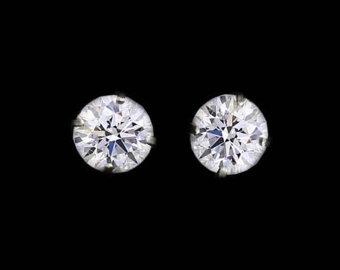 A Pair of Round Brilliant Diamond Earrings in 14K White Gold By C. L. Lewis / Screw-Backs (0.46 TCW) (Ideal-VS1-E+GIA Diamond Dossier's)#C74