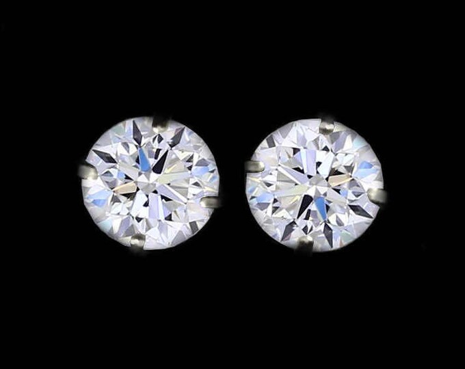 A Pair of Internally Flawless Round Brilliant Diamond Earrings By C. L. Lewis / Screw-Backs (0.50 TCW)(VG-G+GIA Diamond Dossier's)#C76