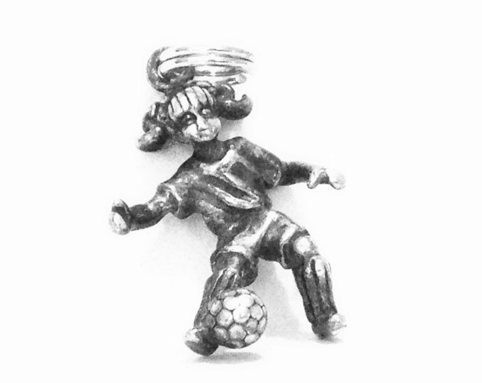 A Cute-Retro 'Girl Kicking Soccerball' Charm-Pendant / Sterling Silver, Spring Clasp, 1x.5x.5", 2.44 Grams #4001