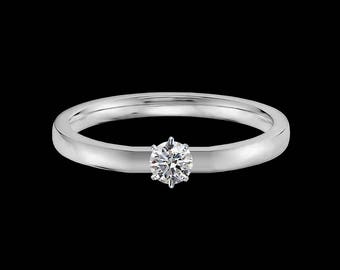 Lewi's 1/4 carat GIA certified diamond engagement ring in 14k white gold.