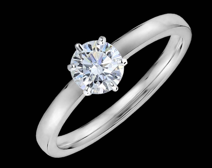 Lewi's 1/2 carat GIA certified diamond engagement ring in 950 platinum.