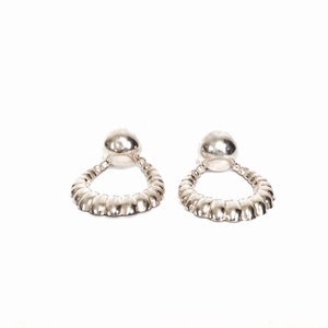 A 1970’s Retro-Modernist Pair Of Sterling Silver Half-Moon-Hooped Hollowed Ball Stud Earrings 1.25x1x.25”, 6.89 Grams, #3088