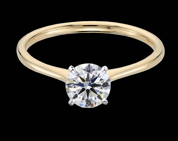 1.00 carat, G color, Ideal cut, VVS1 clarity, GIA certified diamond in gold or platinum.