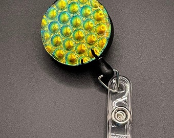 Fused glass retractable badge holder