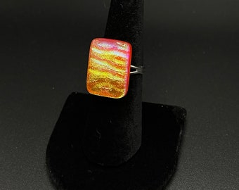 Adjustable orange dichroic fused glass ring