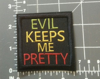 Evil Keeps Me Pretty  (free mailing in U.S.)