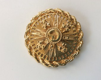 Brooch ST JOHN by Marie Grey. Gold tone  one and half inch.