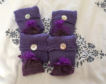 Sachets lavender hand knitted set of 4 with button front. 3 1/2 by 3 1/2 inches.bag of lavender inside.